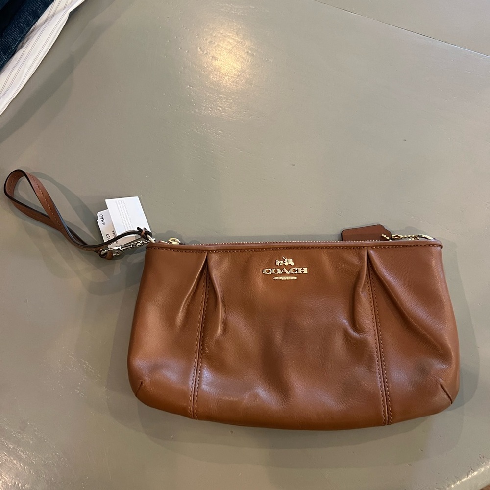 Coach wristlet with tags
